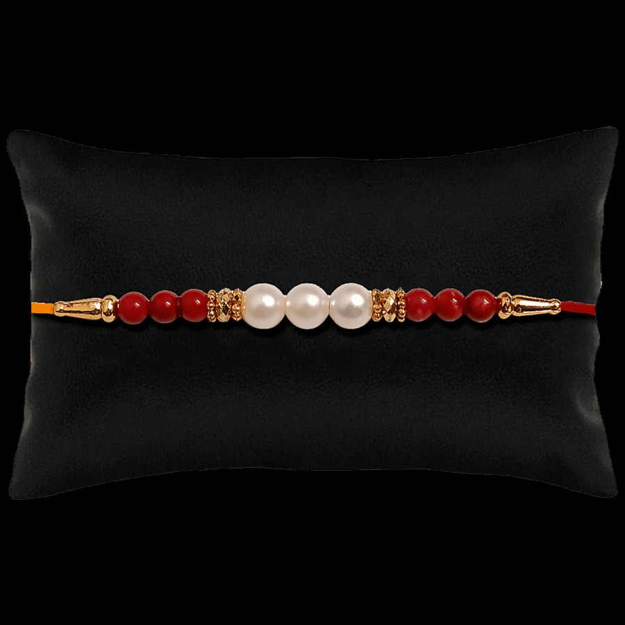 Creative Space Antique Pearl Rakhi - Elegant Design