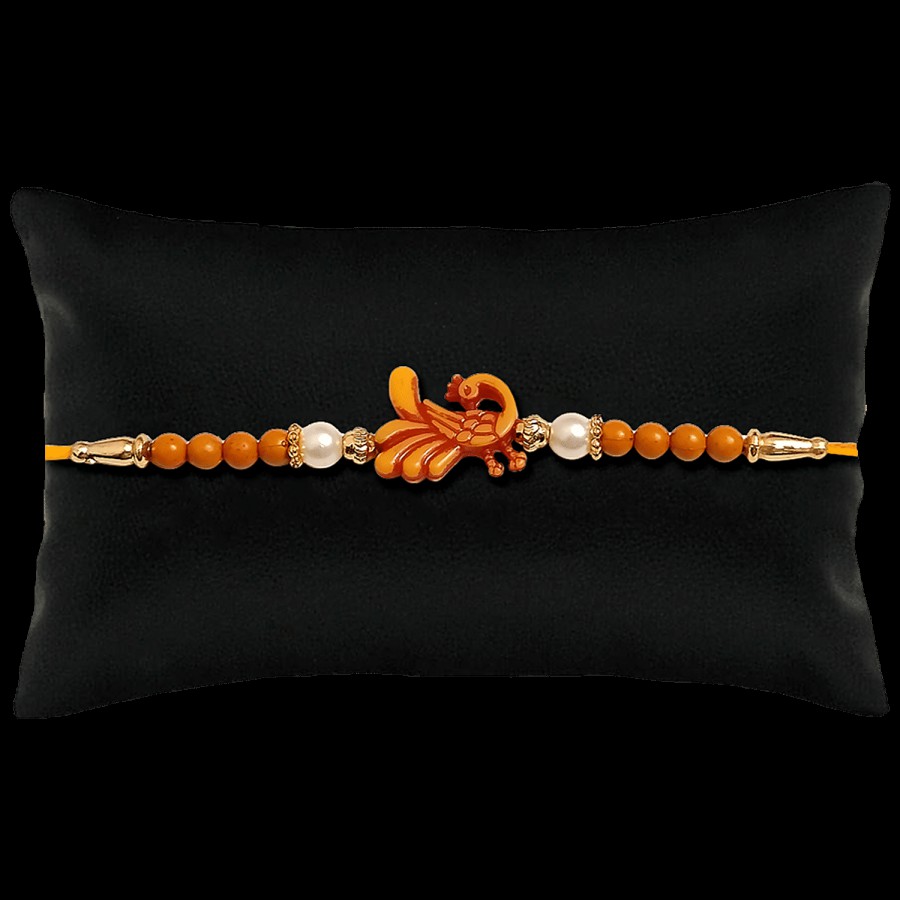 Creative Space Peacock Wooden Rakhi - Elegant Design