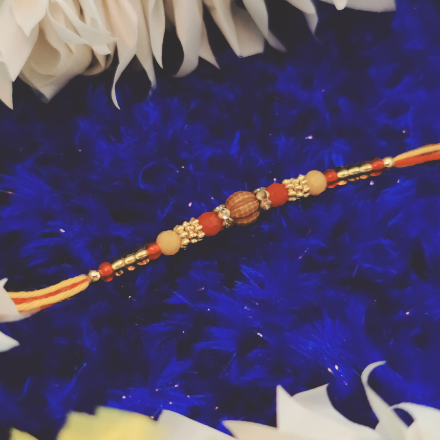 House of Festivals Dori Rakhi - With Wooden Moti Beads