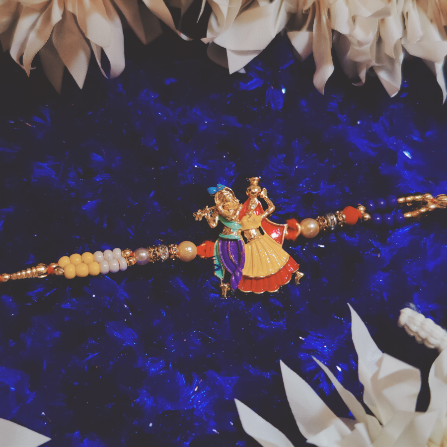 House of Festivals Radha Krishna Rakhi - With Pearl Beads