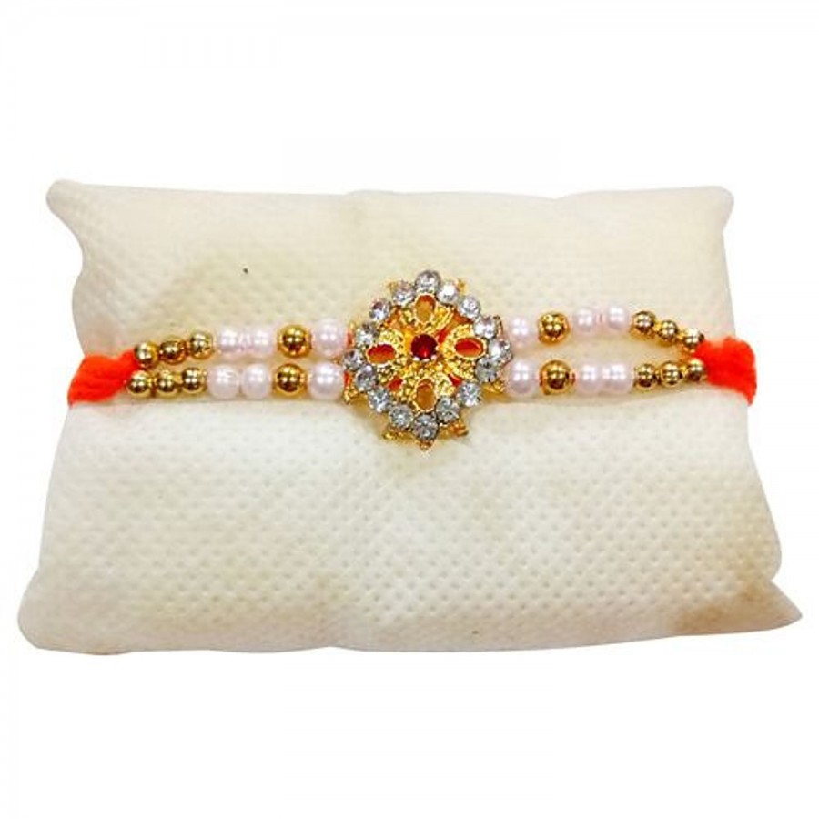 Unique Arts & Interiors Thread Rakhi - Stone Studded Flower