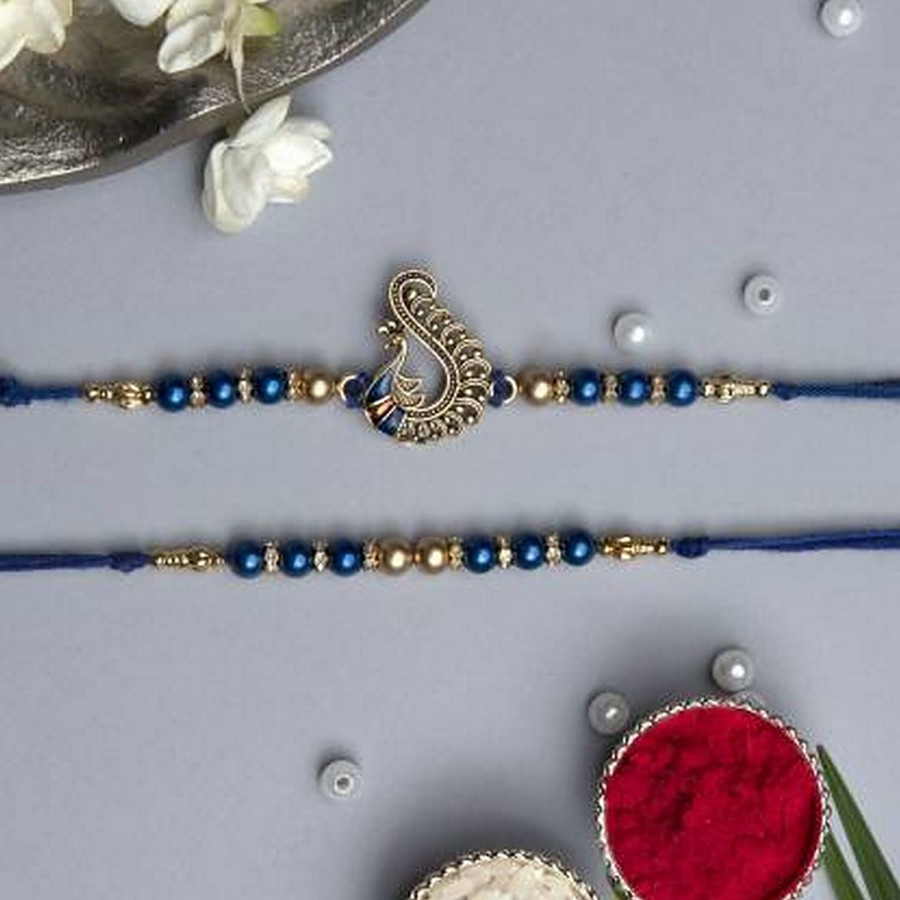 eCraftIndia Blue & Golden Pearls & Peacock Designer Rakhis