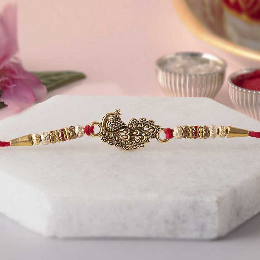 eCraftIndia Golden & Red Beautiful Peacock Designer Rakhi