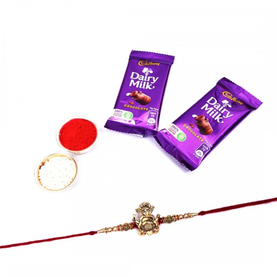 Lord Ganesha Tabla Designer Rakhi Set Of 1 With Dairy Milk Chocolate Bar, 13.2 G Pack Of 2 (RoliChawal)